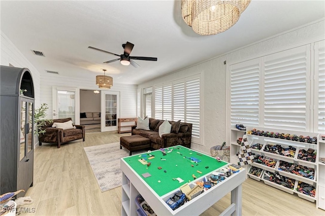 621 Trabue Ave, Punta Gorda, FL 33950 - rec room with visible vents, wood finished floors, a textured wall, and a ceiling fan