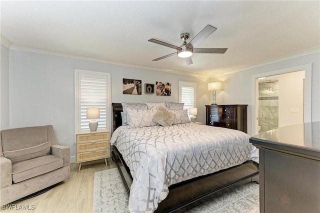 621 Trabue Ave, Punta Gorda, FL 33950 - bedroom with ornamental molding, connected bathroom, light wood finished floors, and ceiling fan