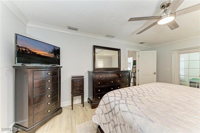 621 Trabue Ave, Punta Gorda, FL 33950 - bedroom with visible vents, crown molding, baseboards, ceiling fan, and light wood-type flooring