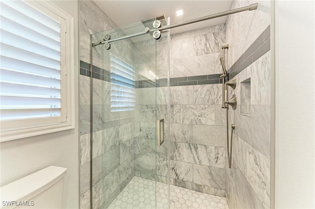 621 Trabue Ave, Punta Gorda, FL 33950 - bathroom featuring toilet and a shower stall