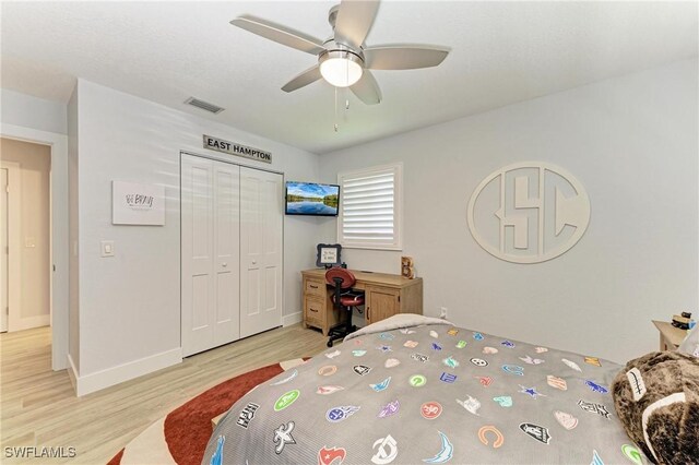 621 Trabue Ave, Punta Gorda, FL 33950 - bedroom with a closet, visible vents, baseboards, ceiling fan, and light wood-style floors