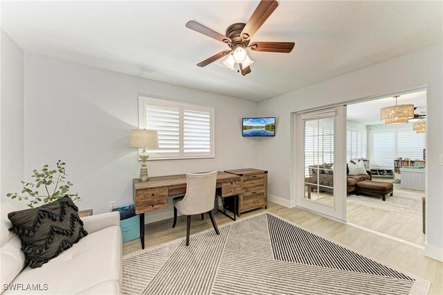 621 Trabue Ave, Punta Gorda, FL 33950 - office featuring baseboards, ceiling fan, and wood finished floors