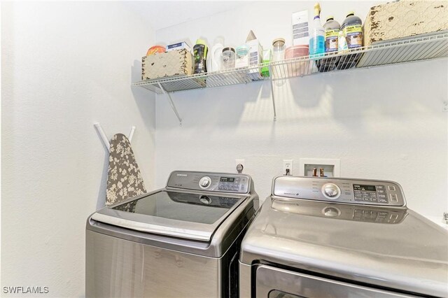 621 Trabue Ave, Punta Gorda, FL 33950 - laundry room featuring washing machine and clothes dryer and laundry area