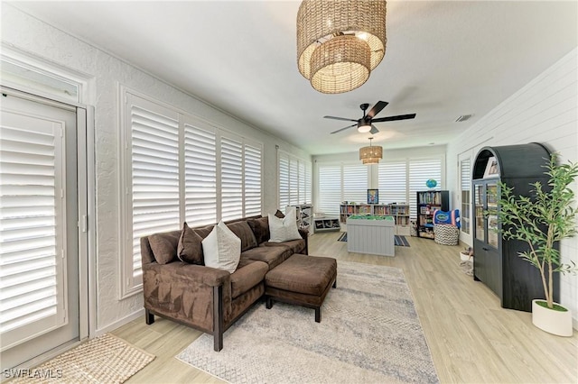 621 Trabue Ave, Punta Gorda, FL 33950 - living area featuring a ceiling fan, light wood-style flooring, and visible vents