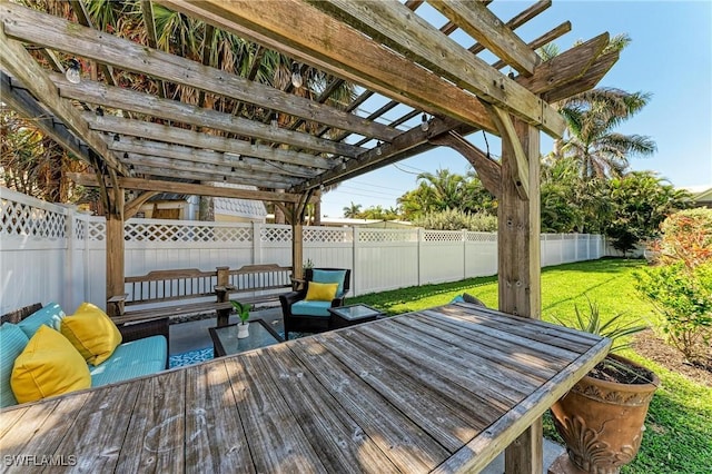621 Trabue Ave, Punta Gorda, FL 33950 - wooden deck featuring a fenced backyard, a pergola, and a yard