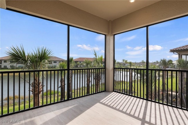 sunroom with a water view