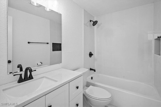 3652 Hibiscus Ave, Naples, FL 34104 - full bath with toilet, vanity,  shower combination, and a textured wall