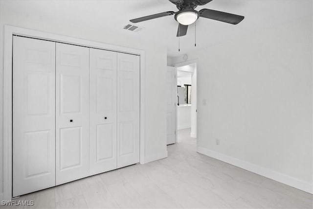 3652 Hibiscus Ave, Naples, FL 34104 - unfurnished bedroom featuring visible vents, baseboards, a closet, and ceiling fan