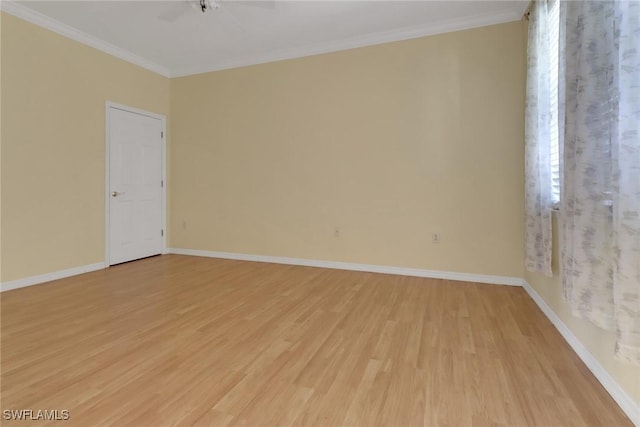 24840 Divot Dr, Bonita Springs, FL 34135 - unfurnished room with light wood-type flooring, ornamental molding, a ceiling fan, and baseboards