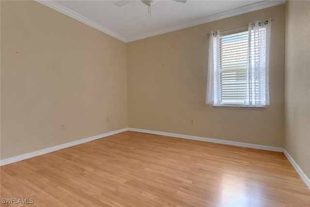 24840 Divot Dr, Bonita Springs, FL 34135 - empty room featuring ornamental molding, light wood-style flooring, a ceiling fan, and baseboards