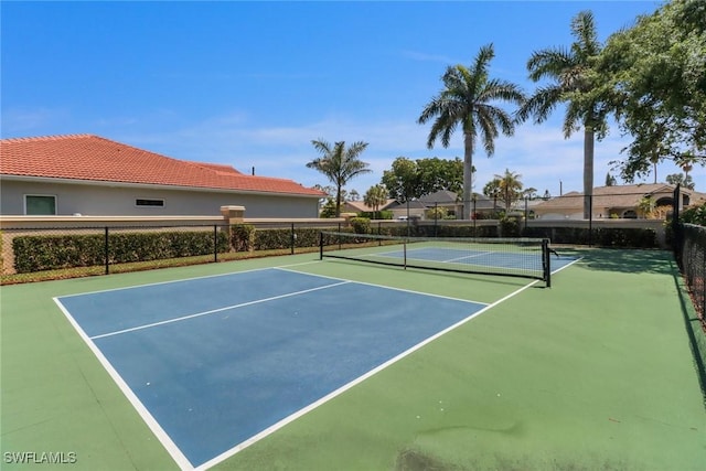 24840 Divot Dr, Bonita Springs, FL 34135 - view of tennis court with community basketball court