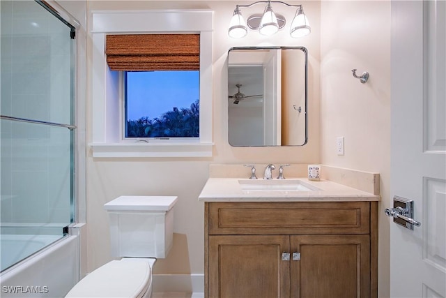 full bathroom with shower / bath combination with glass door, toilet, and vanity