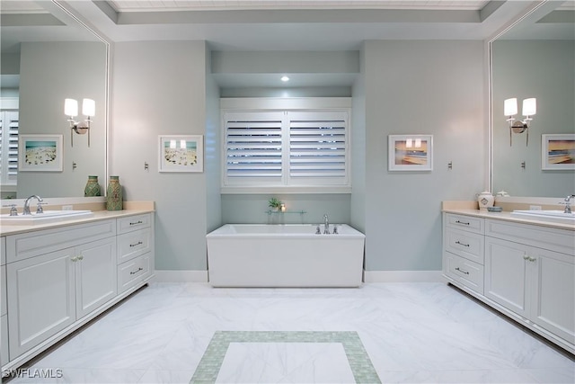 full bath featuring baseboards, marble finish floor, and a sink