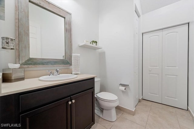 5135 Genoa St, Ave Maria, FL 34142 - bathroom with vanity, tile patterned floors, toilet, and baseboards