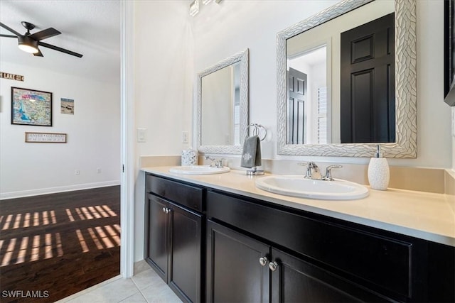 5135 Genoa St, Ave Maria, FL 34142 - full bathroom featuring a sink, ceiling fan, double vanity, and tile patterned flooring