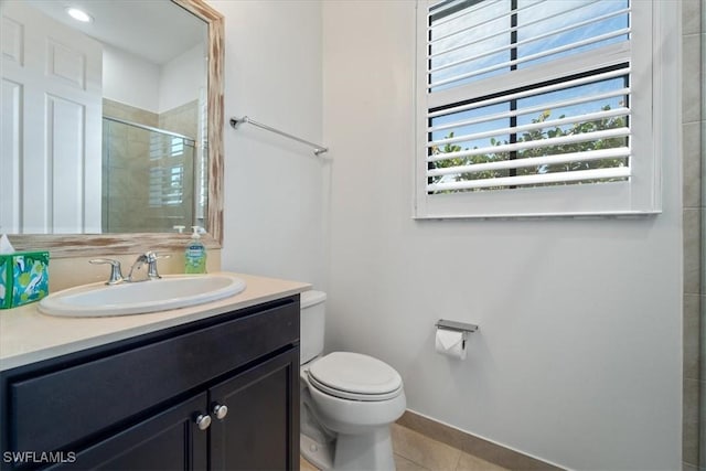 5135 Genoa St, Ave Maria, FL 34142 - full bath featuring tile patterned floors, a shower stall, toilet, and vanity