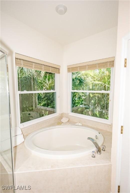 bathroom featuring a bath