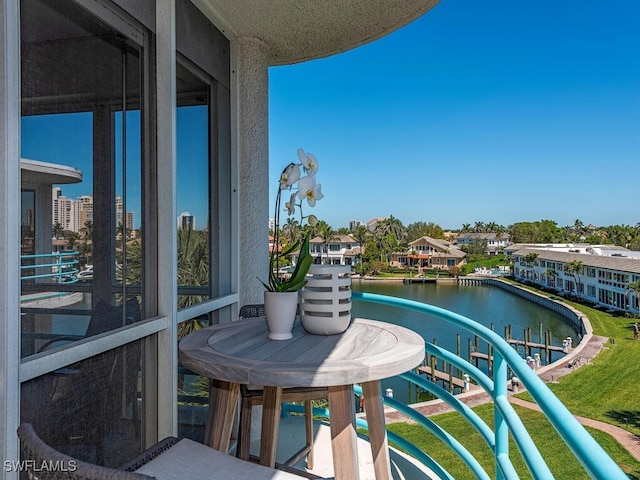 balcony featuring a water view