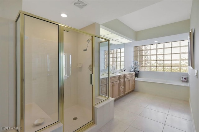 full bathroom featuring tile patterned flooring, visible vents, a shower stall, and a bath