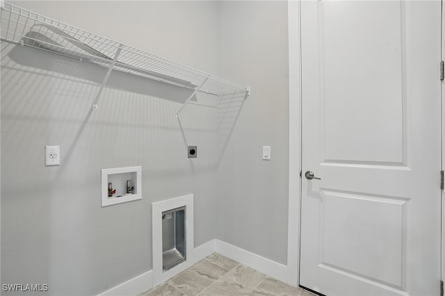 3906 E 10th St, Lehigh Acres, FL 33972 - laundry room featuring electric dryer hookup, baseboards, and hookup for a washing machine