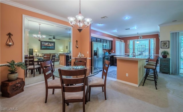 20695 Country Barn Dr, Estero, FL 33928 - dining room with visible vents, light carpet, ornamental molding, and ceiling fan with notable chandelier