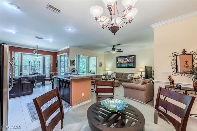 20695 Country Barn Dr, Estero, FL 33928 - dining room featuring light tile patterned floors, visible vents, ceiling fan with notable chandelier, and ornamental molding