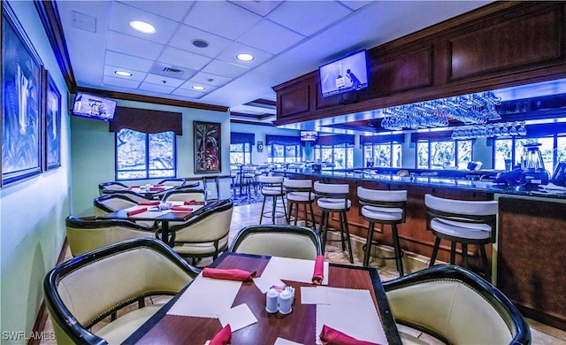 20695 Country Barn Dr, Estero, FL 33928 - bar featuring visible vents, ornamental molding, recessed lighting, a paneled ceiling, and a raised ceiling