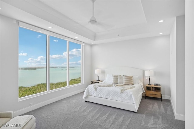 4971 Bonita Bay Blvd Unit Ph2503, Bonita Springs, FL 34134 - bedroom with carpet flooring, recessed lighting, a water view, and a raised ceiling