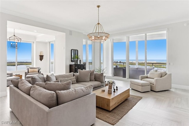 4971 Bonita Bay Blvd Unit Ph2503, Bonita Springs, FL 34134 - living area featuring a chandelier and a water view