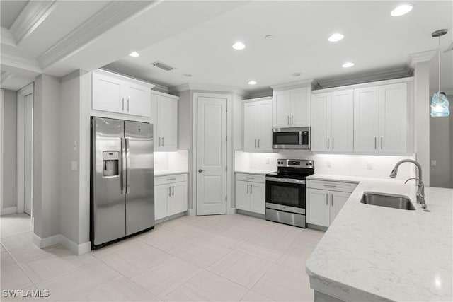 9654 Montelanico Loop Unit 102, Naples, FL 34119 - kitchen featuring stainless steel appliances, a sink, ornamental molding, backsplash, and recessed lighting