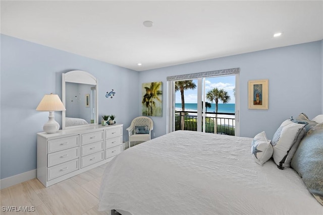 3333 Gulf Shore Blvd N Unit 4, Naples, FL 34103 - bedroom with recessed lighting, baseboards, a water view, and access to outside