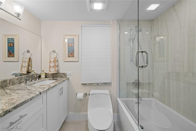 3333 Gulf Shore Blvd N Unit 4, Naples, FL 34103 - bathroom with vanity, toilet, baseboards, and combined bath / shower with glass door