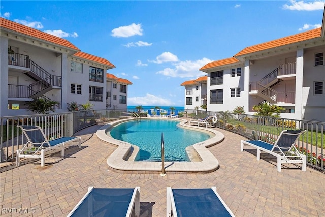 3333 Gulf Shore Blvd N Unit 4, Naples, FL 34103 - pool with a patio area and fence