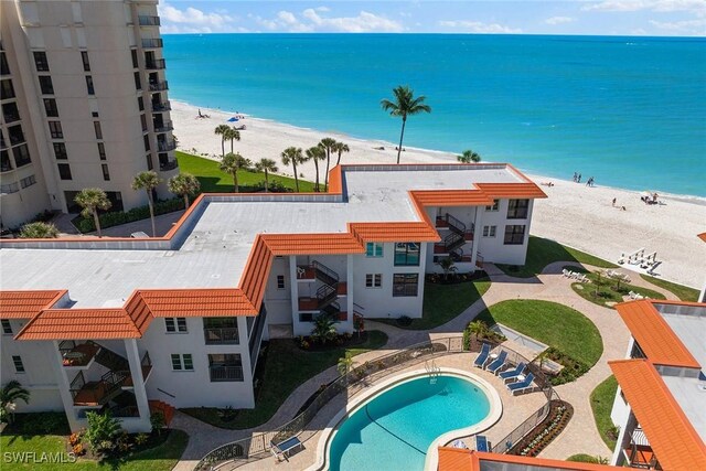 3333 Gulf Shore Blvd N Unit 4, Naples, FL 34103 - exterior space featuring a water view, a patio, and a view of the beach