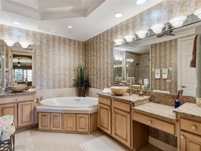 11239 Bienvenida Ct Unit 102, Fort Myers, FL 33908 - bathroom with a shower stall, wallpapered walls, a ceiling fan, and a garden tub