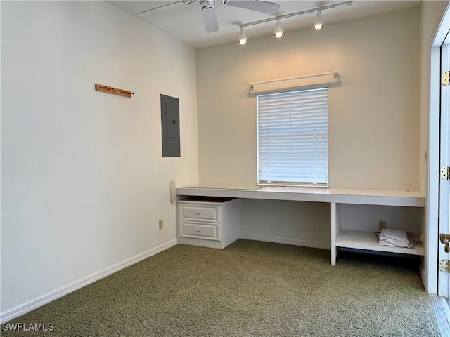 234 W Circle Dr, Clewiston, FL 33440 - unfurnished office with baseboards, ceiling fan, carpet floors, electric panel, and built in desk