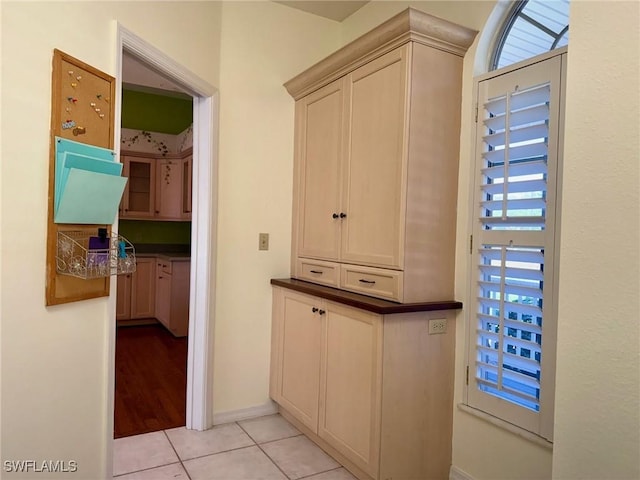 234 W Circle Dr, Clewiston, FL 33440 - hallway with light tile patterned flooring and baseboards