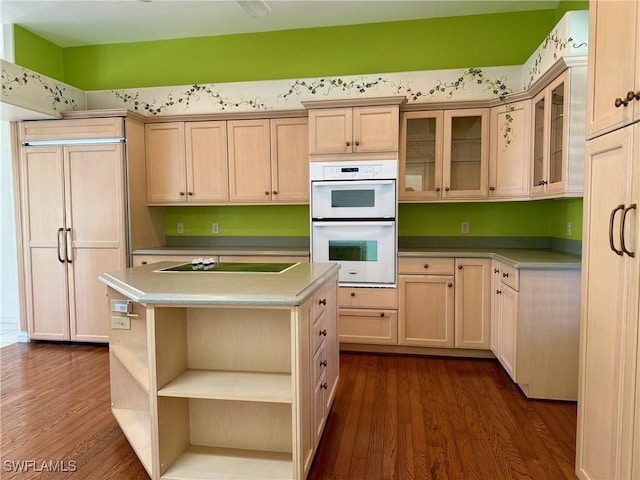 234 W Circle Dr, Clewiston, FL 33440 - kitchen featuring open shelves, dark wood-style floors, black electric stovetop, paneled built in refrigerator, and white double oven