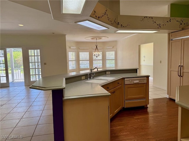 234 W Circle Dr, Clewiston, FL 33440 - kitchen featuring a sink, pendant lighting, light tile patterned flooring, and dishwasher
