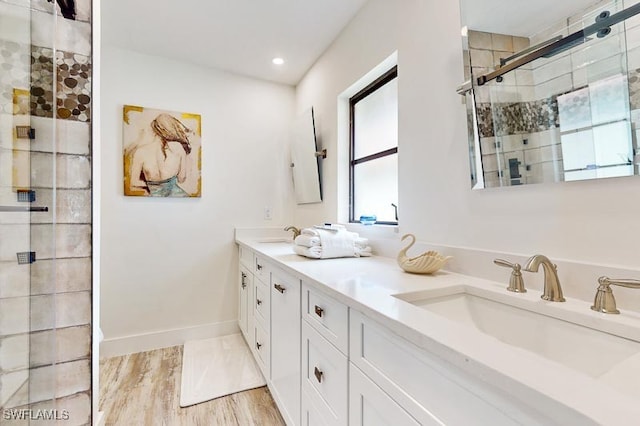 27881 Meadowlark Ln, Bonita Springs, FL 34134 - bathroom featuring a stall shower, double vanity, and recessed lighting