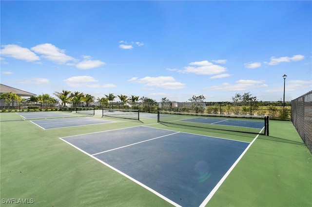 238 Indies Dr E Unit 101, Naples, FL 34114 - view of tennis court with community basketball court and fence