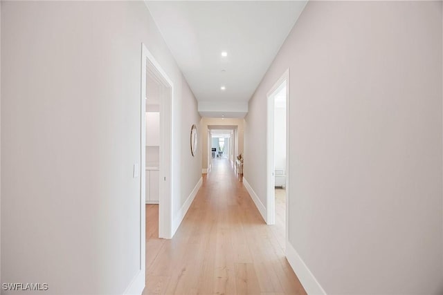 1165 8th St S Unit 202, Naples, FL 34102 - corridor with baseboards, light wood-style flooring, and recessed lighting