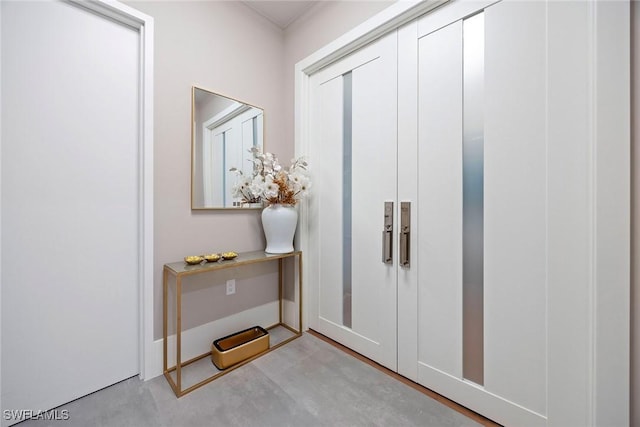 1165 8th St S Unit 202, Naples, FL 34102 - interior space featuring concrete flooring