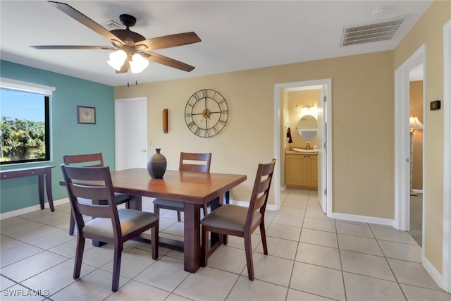 4764 Pembrooke Ln, Bonita Springs, FL 34134 - dining room featuring baseboards, a ceiling fan, visible vents, and light tile patterned floors