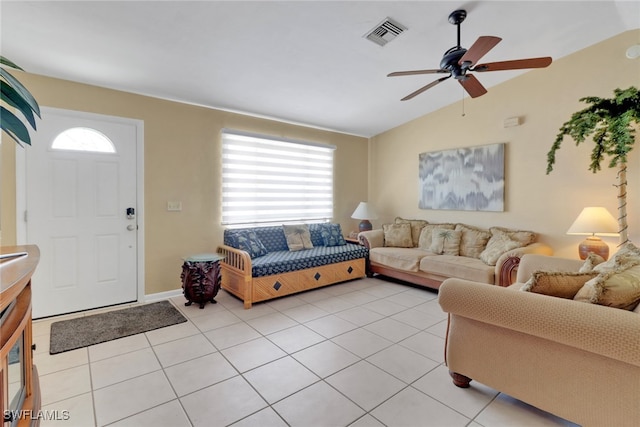 4764 Pembrooke Ln, Bonita Springs, FL 34134 - living room with a ceiling fan, light tile patterned floors, vaulted ceiling, and visible vents