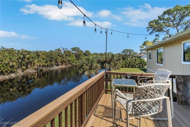 4764 Pembrooke Ln, Bonita Springs, FL 34134 - deck with a water view and outdoor dining space