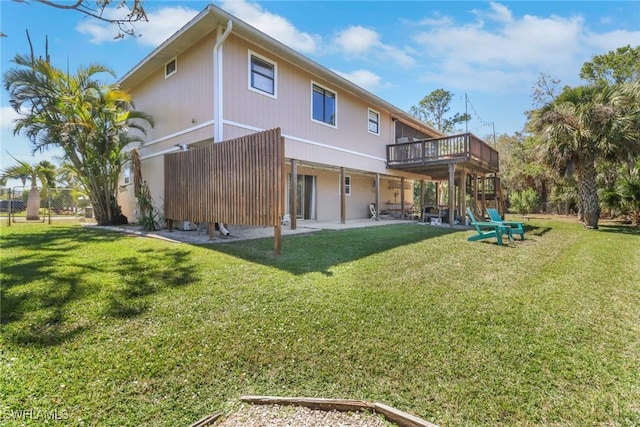 4764 Pembrooke Ln, Bonita Springs, FL 34134 - rear view of property featuring a deck, a yard, and a patio