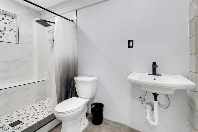 4764 Pembrooke Ln, Bonita Springs, FL 34134 - bathroom with toilet, a stall shower, and wood finished floors