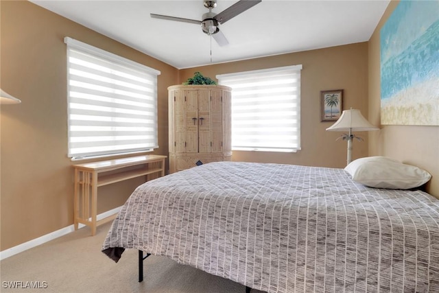 4764 Pembrooke Ln, Bonita Springs, FL 34134 - carpeted bedroom with baseboards and a ceiling fan