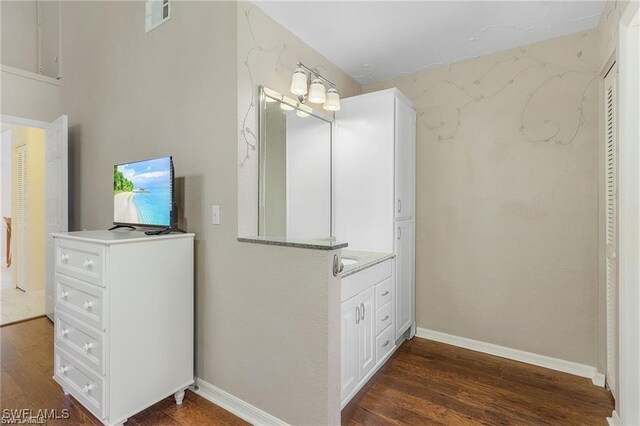70 Emerald Woods Dr Unit K8, Naples, FL 34108 - bathroom featuring wood finished floors, visible vents, and baseboards